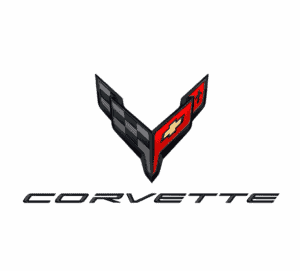 Das Emblem zeigt zwei sich kreuzende Fahnen in V-Form: eine mit einem schwarz-grauen Schachbrettmuster und eine rote Fahne mit dem Chevrolet-Bowtie und einem Lilienkreuz. Darunter steht der Schriftzug CORVETTE in modernen, kursiven Großbuchstaben. Das Logo steht für Sportlichkeit und Renntradition.